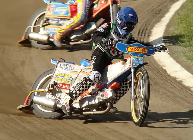 Speedway bikes 2 in number seen racing on dirt track