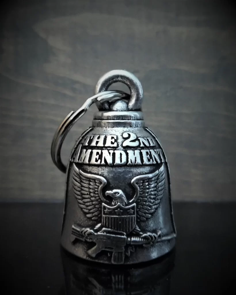 Image of a guardian bell on dark gray background. The 2nd Amendment is engraved on the bell.